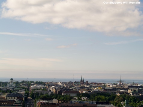 Three church spires above the Helsinki skyline